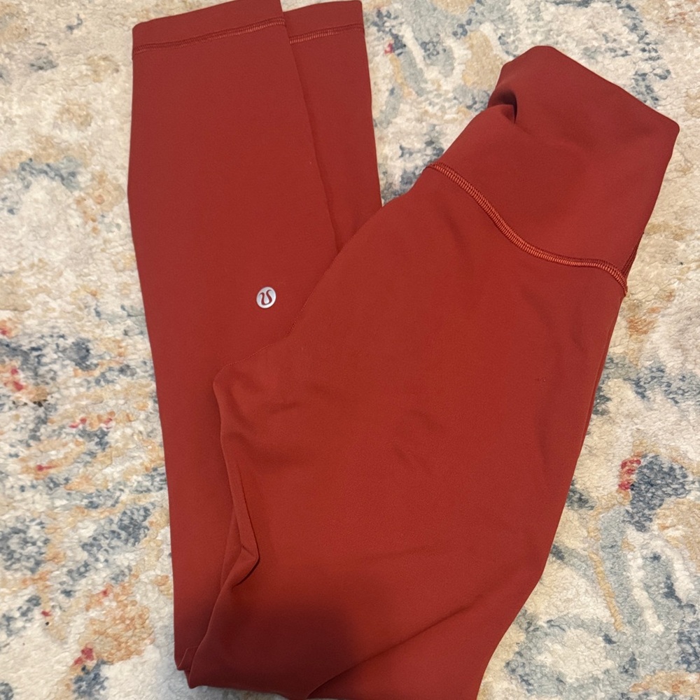 Lululemon Wunder Train High Rise size 4 , 25” in color Cayanne